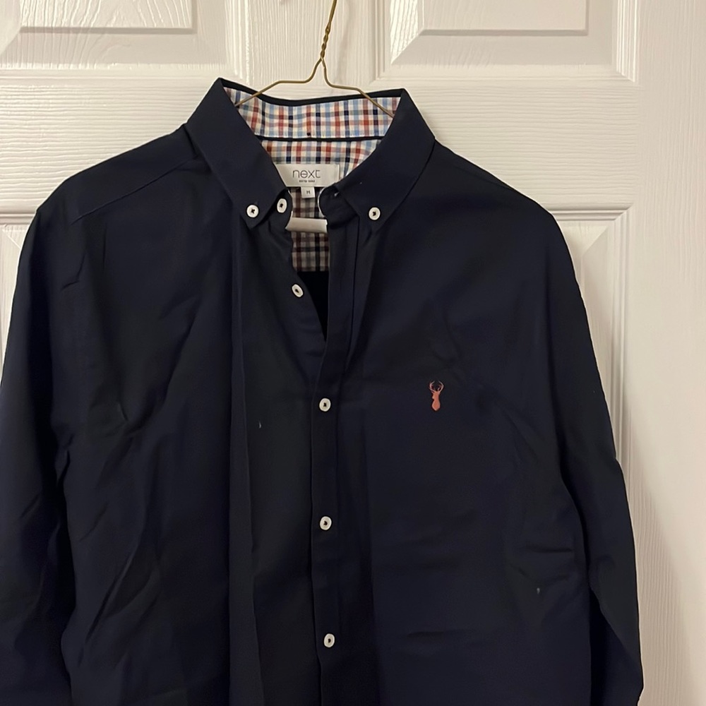 Brand new men’s evening button down in dark navy. Size M